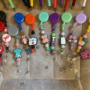 Badge reels and pens! All beaded and can be made to order!